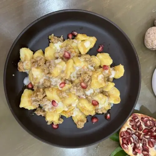 ricerca Gnocchi di patate agnello zucca melograno e parmigiano liquido