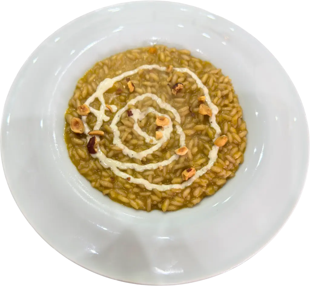 ricetta Risotto zucca e turasi con nocciole e camembert di bufala